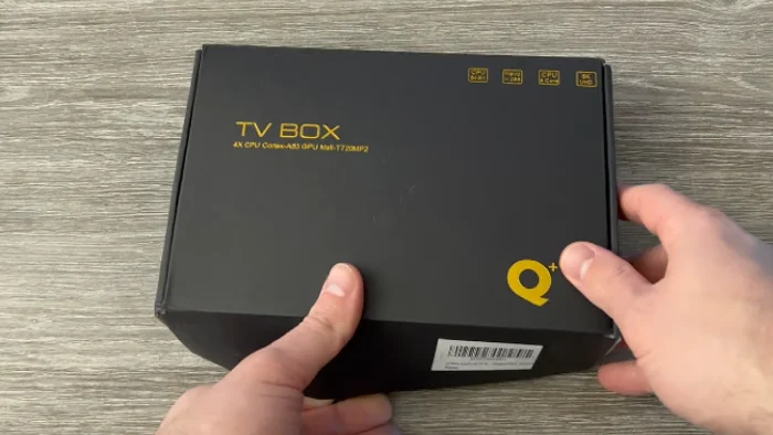 Q Plus Android TV Box showing packaging